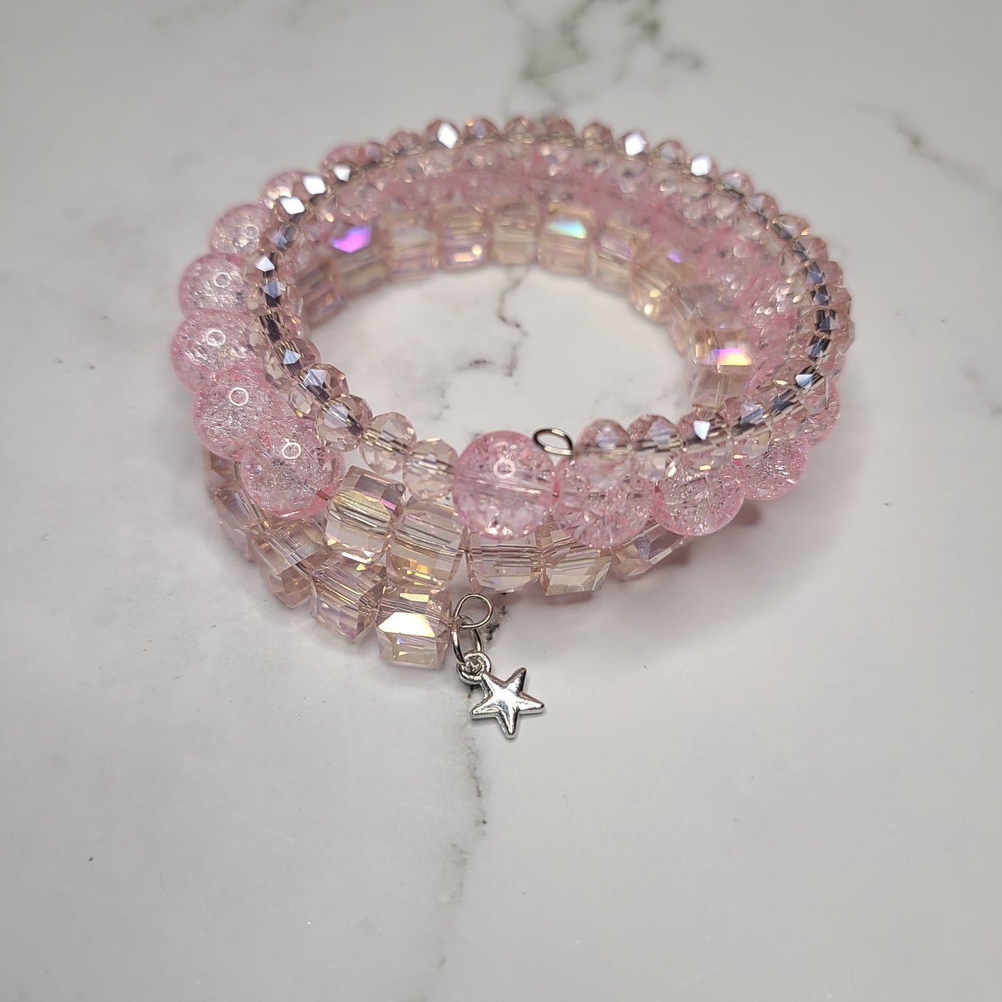 Handmade Pink Glass Beaded Memory Wire Bracelet with Small Silver Star charm.