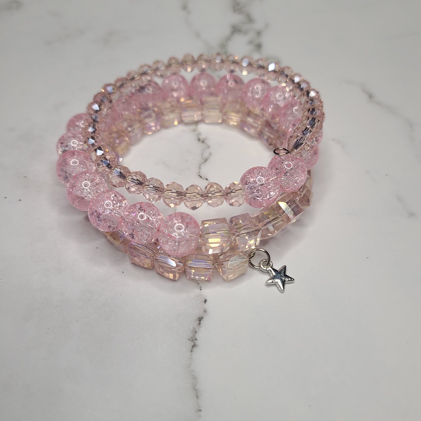 Handmade Pink Glass Beaded Memory Wire Bracelet with Small Silver Star charm.