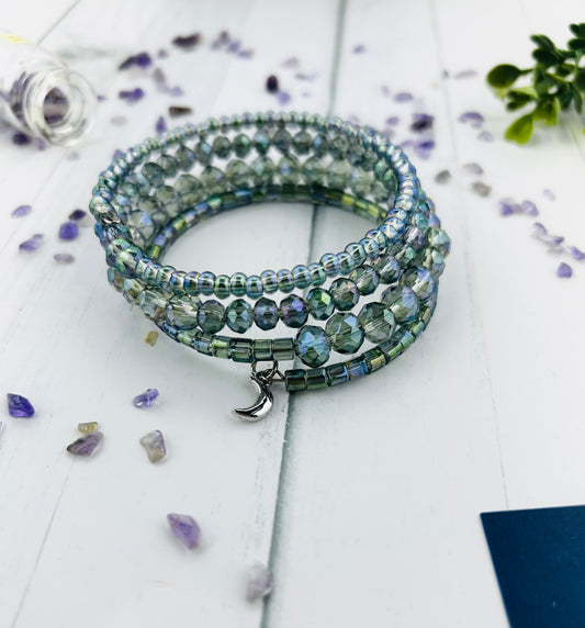 Handmade Glass Beaded Memory Wire Bracelet with Small Silver Moon charm.