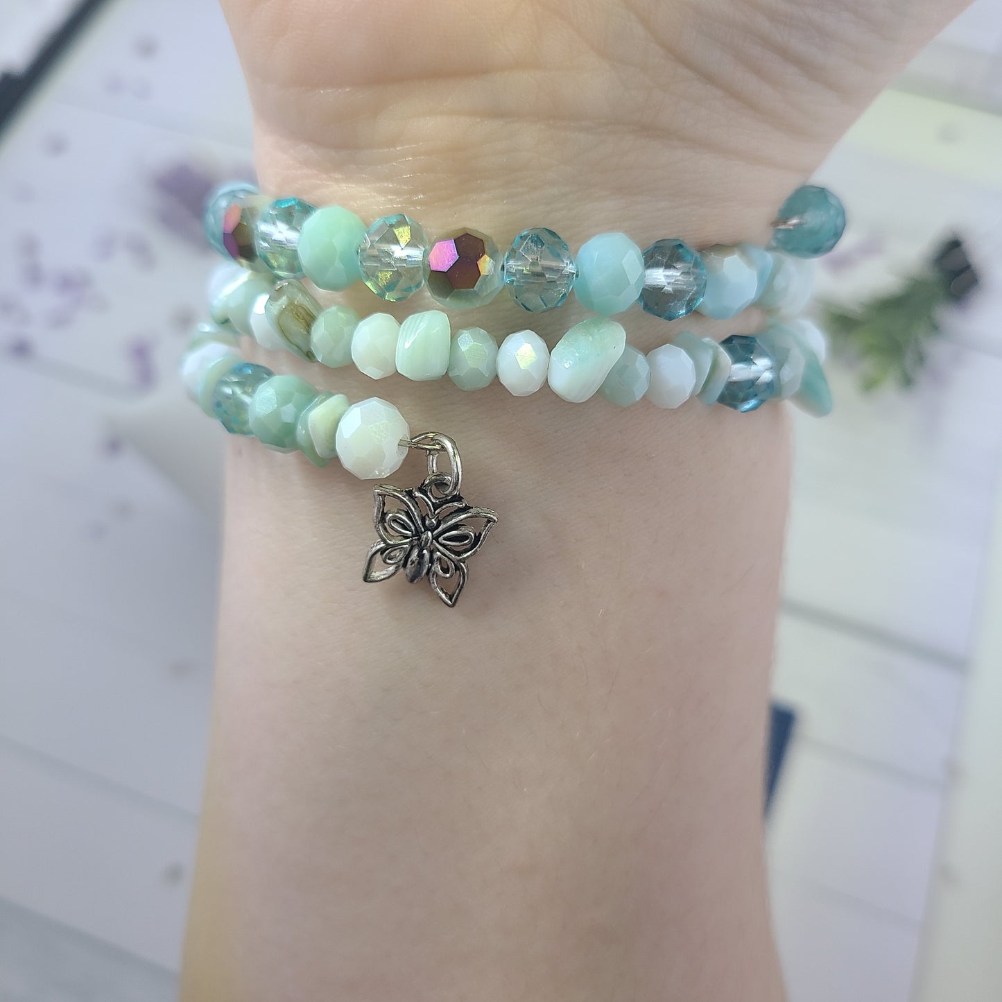 Handmade Teal, Aqua Blue Glass Memory Wire Wrap Beaded Bracelet with Silver Butterfly Charm.