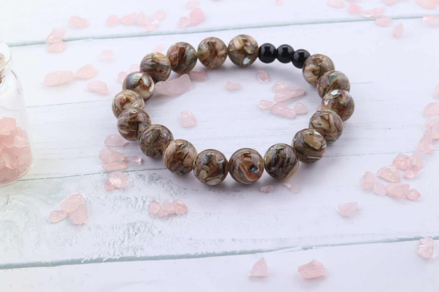 Handmade Beaded Brown Shell Stretch Bracelet with pops of Flash and Shine.