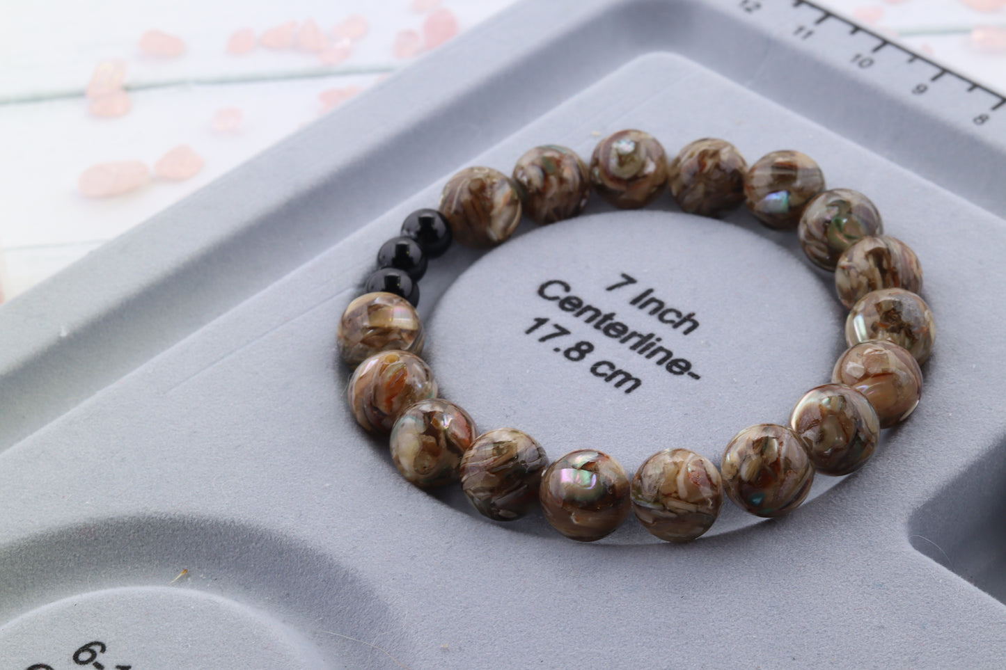 Handmade Beaded Brown Shell Stretch Bracelet with pops of Flash and Shine.