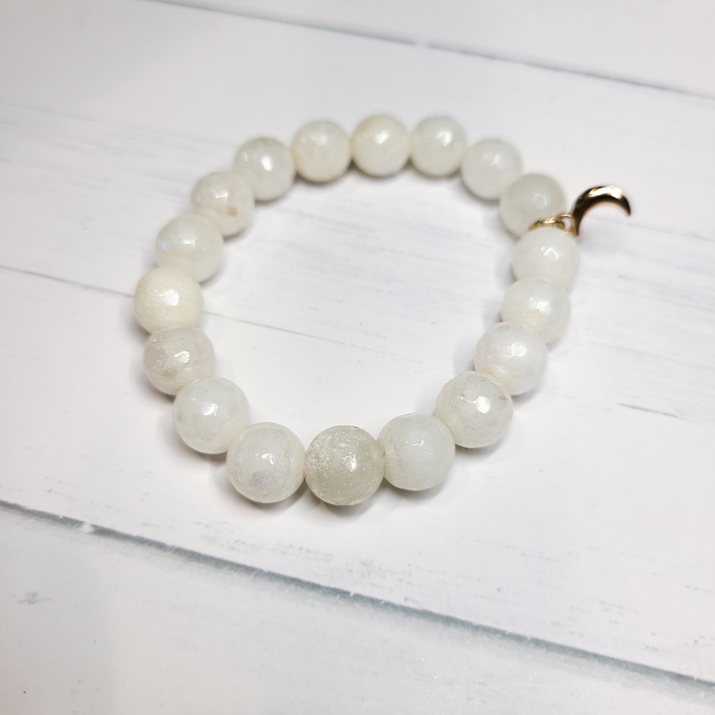 Handmade White Crackle Quartz Stretch Bracelet with Gold Plated Moon Charm.