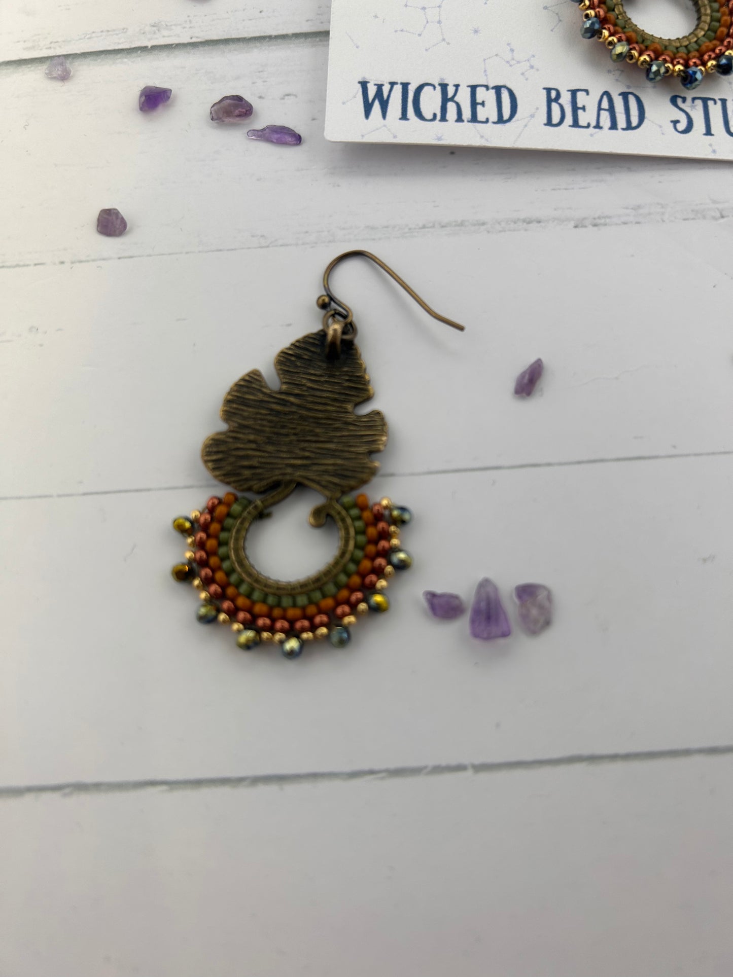 Handmade Beaded Antique Brass Leaf Fishhook Earrings Beaded with Glass and Galvanized Seed Beads.