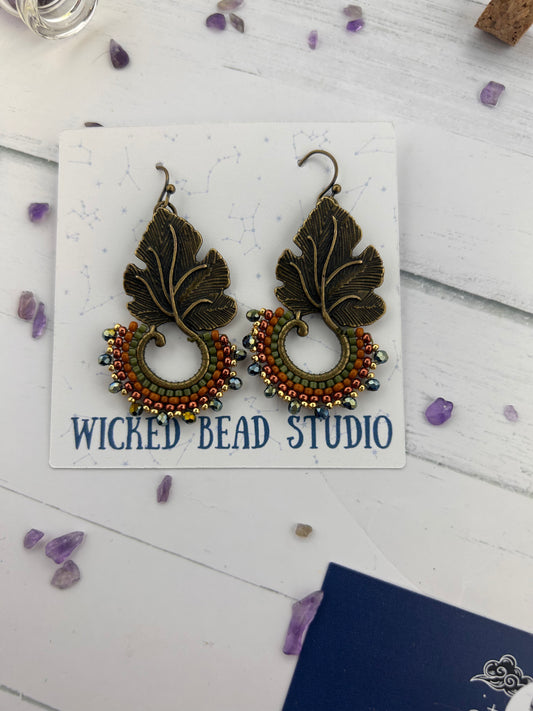 Handmade Beaded Antique Brass Leaf Fishhook Earrings Beaded with Glass and Galvanized Seed Beads.
